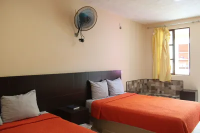 Hotel Guaranducha Inn Отели рядом с достопримечательностью «Сад Ботанико Смуч-Альтун»