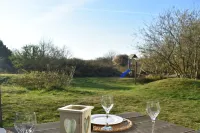 Large, detached cottage, 5 stars, near the beach, beautiful view. Hotels in Buren