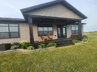 Cozy Waterfront Country Home w/game room. Close to all amenities!