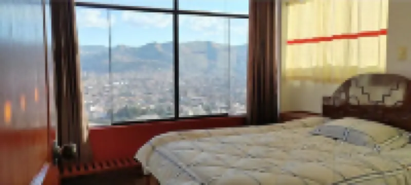 Family-sized, beautifull panoramic view of Cusco City, save an cozy place. Hotel di 