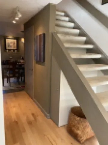 Elegant Townhome, park-like setting. Local event transportation provided.