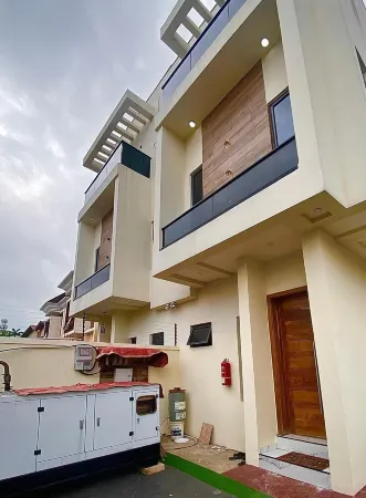Modern 4-story apartment At omole Phase 2, Lagos. Spacious, stylish, convenient.