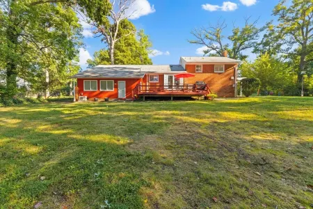 Dog Friendly with Fully Fenced Half Acre Yard, Prime Location, and in-Law Suite!