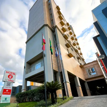 Le Village Flats e Hotel