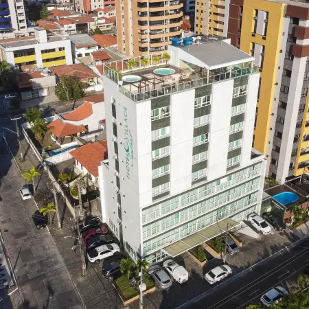 Hotel Village Confort Отели рядом с достопримечательностью «Пляж Манаира»