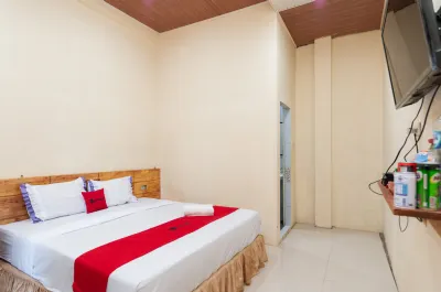 Super OYO 1696 Sapo Rumbia Hotels near Pembibitan Rama Putra Kepala Suku