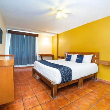 Capital O Hotel Casa Blanca