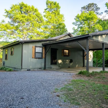 Paw Paw's Fish Tales Cabin on Lake Guntersville with 2 slip Boat Dock