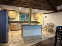 Beautiful private beach area within steps from the modern updated log home