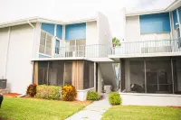 Enjoy sunny water views from your private lanai.  Steps to Madeira Beach.