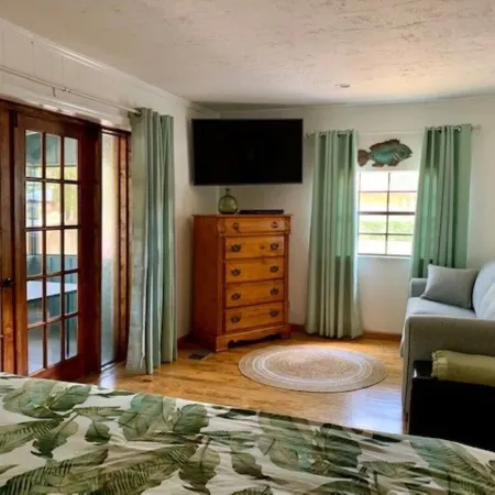 Rustic newly remodeled River House on working fish house property . Gulf access