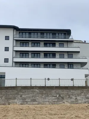 On the Beach! Gorgeous designer apartment with stunning sea views