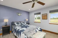 Lake view house with expansive views, fireplace, walk in showers, Ember mugs.