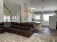 Close to beach! Family-sized home with pool and hot tub.