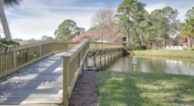 Newly Renovated! Idyllic Lake Views, Golf Cart Included, Beach Close By!