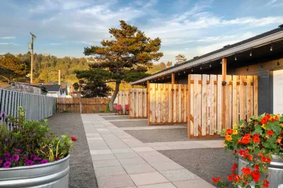 Kitchenette and Cozy Patio Area - Stylish Coastal Retreat Hotels in Rockaway Beach