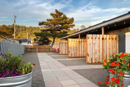 Kitchenette and Cozy Patio Area - Stylish Coastal Retreat Hotels in Rockaway Beach