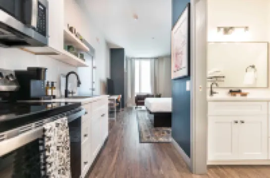 Floor-to-Ceiling Windows and Full Kitchen - Charming Modern Retreat