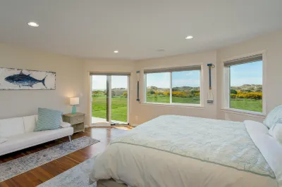 Luxe oceanfront home with decks, grill, fireplace, gourmet kitchen, & fast WiFi