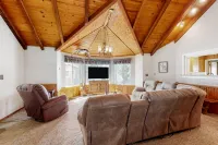 Remodeled partial lake-view home with dock, beach & boat trailer parking