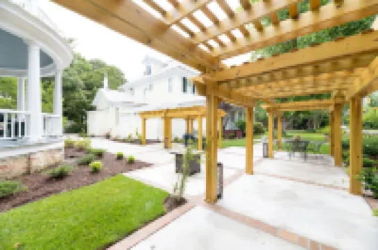 Charming Sitting Porch and Cozy Amenities - Delightful Escape