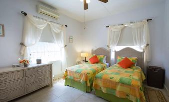 Welcome to the Unpretentious and Breezy Graceville, Steps Away from the Beach