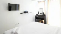 Comfy and Modern Studio (No Kitchen) at Orchard Supermall Mansion Apartment Hotels in Sambikerep Subdistrict