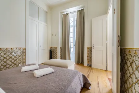 Santa Justa Prime Guesthouse Отели рядом с достопримечательностью «Триумфальная Арка на руа Аугушта»