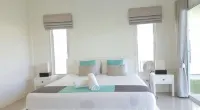 Hua Hin Pool Villa with 4 Bedrooms L50 Отели в г. 