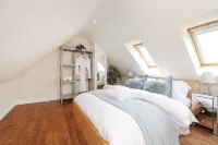 Joivy Greenknowes Lodge with Hot Tub and Wood Burning Stove