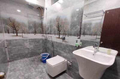 Deluxe Triple Room Hotel De Pebbles Photo