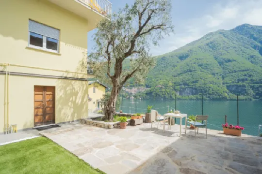 La Quiete with Private Garden by Rent All Como