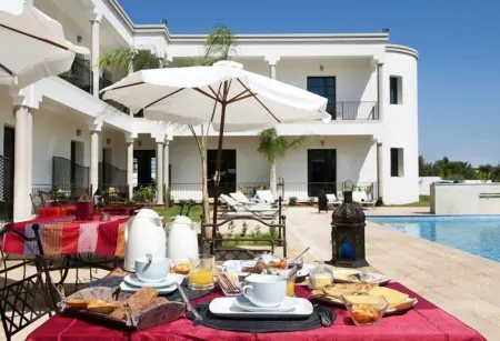 Villa Agapanthe Отели рядом с достопримечательностью «Mosquée Meriem Borkaoui»