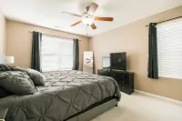 Charming 3-bedroom oasis in lovely Pooler with hot tub, king bed,  and Smart TVs