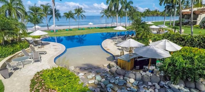 Spacious Open-Concept Condo with Stylish Design, Direct Beach Access & Resort-Style Amenities Hotels in Playa Flamingo