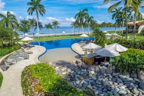 Spacious Open-Concept Condo with Stylish Design, Direct Beach Access & Resort-Style Amenities