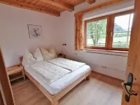 Spacious, sunny country house in the Alps with its own garden