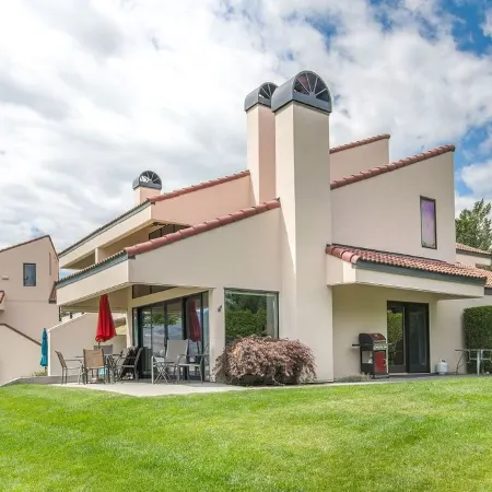 Luxury waterfront townhouse w/ sandy beach outside your patio door! WOW!