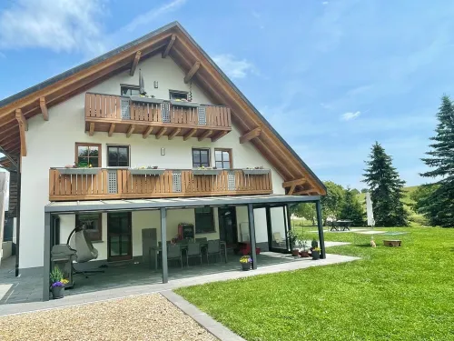 Modern top floor apartment with spacious outdoor area in a quiet location