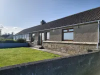Bungalow with sea-view, near small town of Thurso.