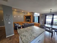 Lake Front home Sleeps 10 Overlooking deck for perfect lake views & a coffee bar
