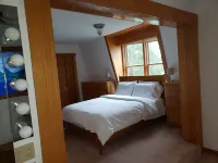 Awesome Lake House with Natural Beach, Huge Dock, and Sunset Views. Sleeps 9