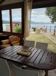 Independent villa with private beach on the lake