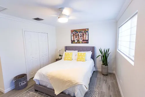 Modern Condo a few steps from sandy beach and resorts
