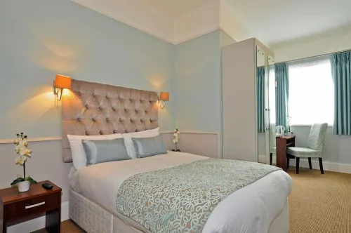 Maples House Hotel - Parkplatz