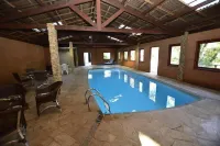 Hotel Pião Mineiro - ที่มีสระว่ายน้ำ
