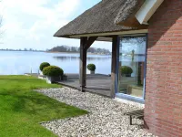 Stylish Thatched Villa with 2 Bathrooms Near Giethoorn Hotels in Wanneperveen