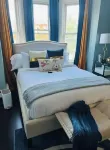 A luxurious stay. Hotels near Tower of Victory