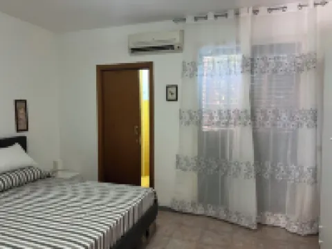 Vacation home with large outdoor space, 3 rooms, kitchen within walking distance to the sea Hotels in Costa Saracena - Castelluccio