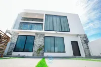 Modern 2 bedroom Villa with Pool, Ocean Vista, WIFI, AC, and Enhanced Safety Hotels in Prampram